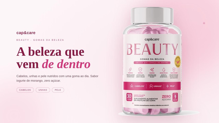 Frasco rosa do Beauty Gomas da cap&care sobre penteadeira branca