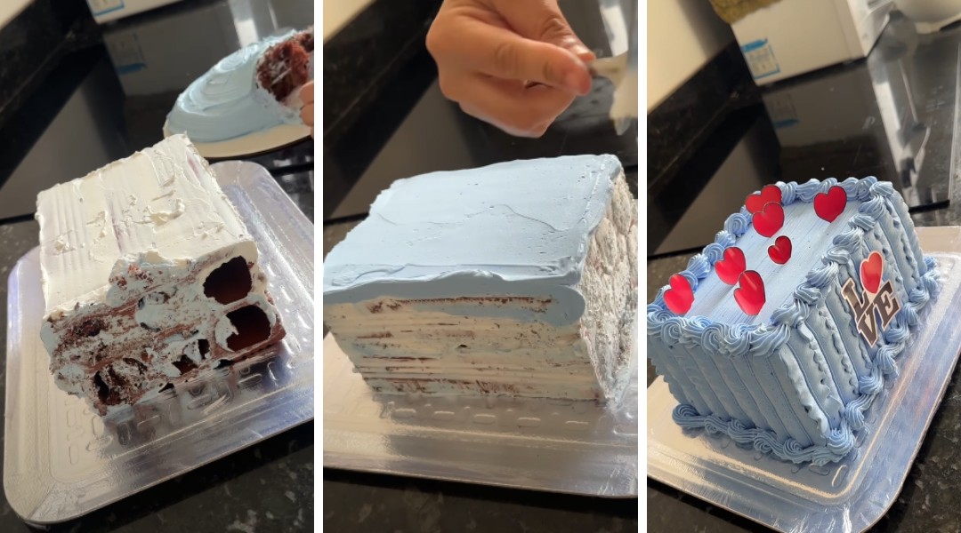 Confeiteira segurando tijolo decorado para parecer um bolo