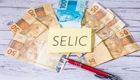 Manutenção da Selic pressiona e eleva risco de inadimplência